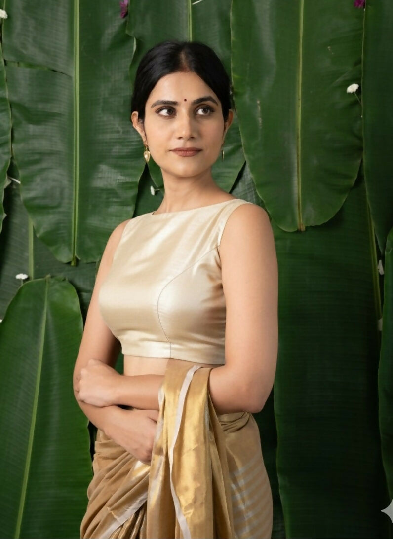 Navya Golden Tissue Sleeveless Back Open Blouse